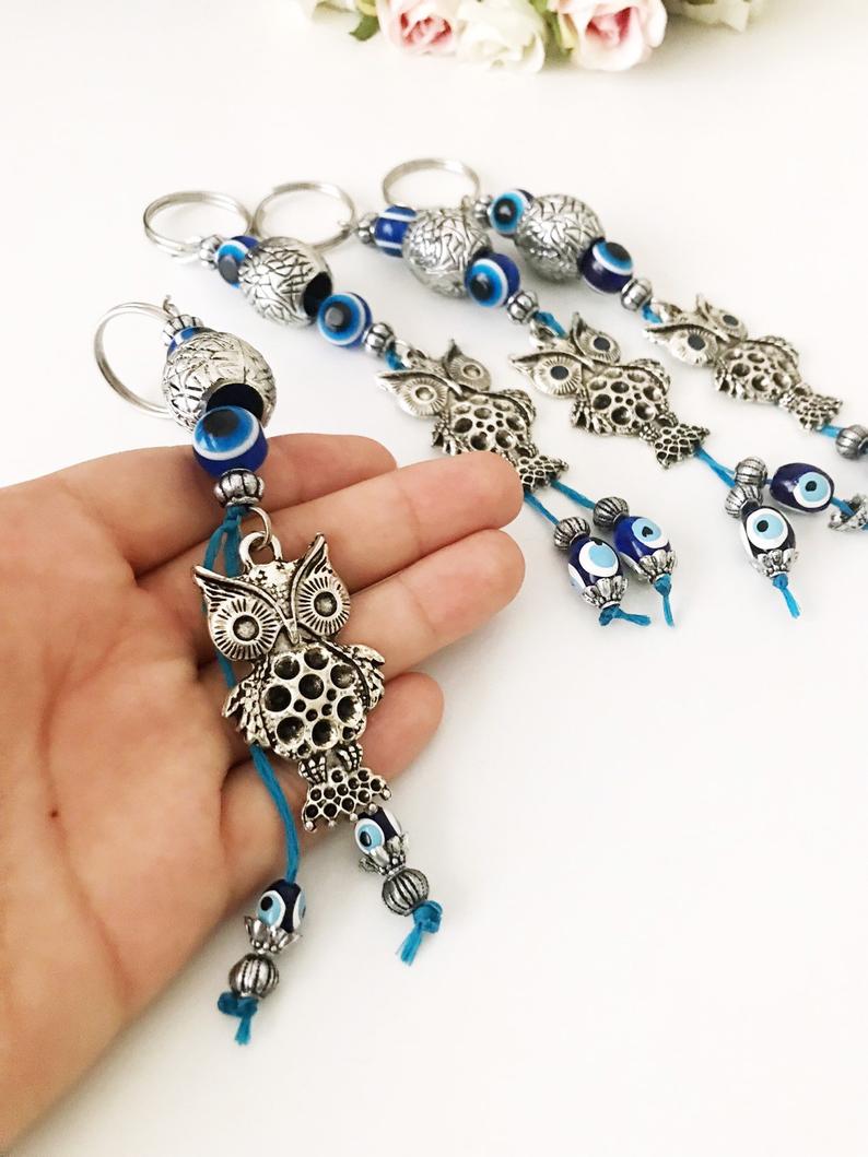 Metal owl keychain with evileye