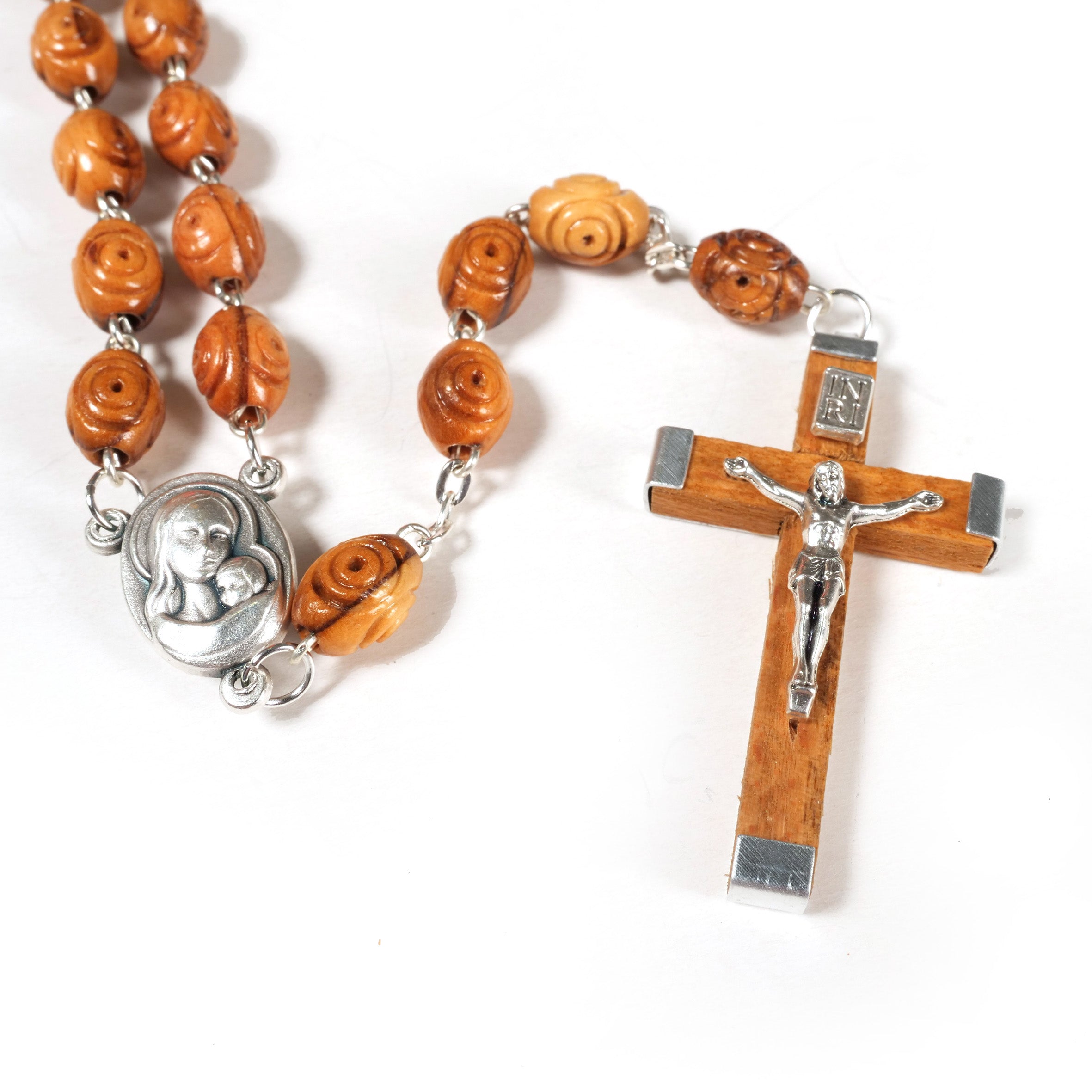 Rosenkranz mit dekorierten Perlen aus Olivenholz
